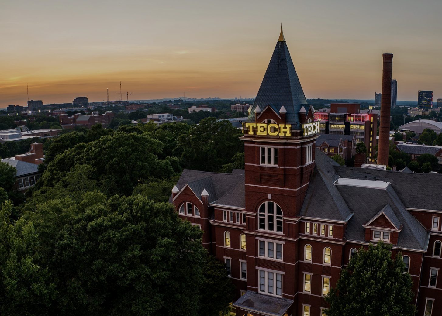 Tech Tower and the Georgia Tech campus at sunset, midtown Atlanta behind